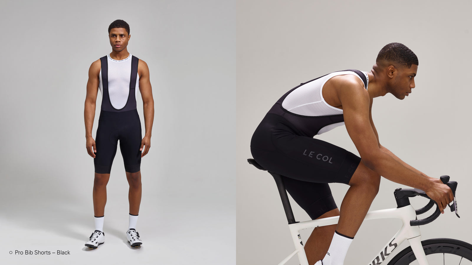 Studio shot of man in black pro bibshorts with black mesh straps.