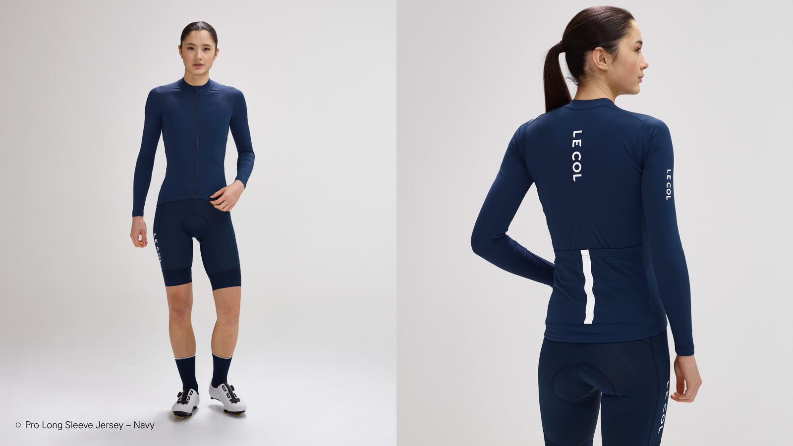 Studio shot of woman in navy pro long sleeve jersey.