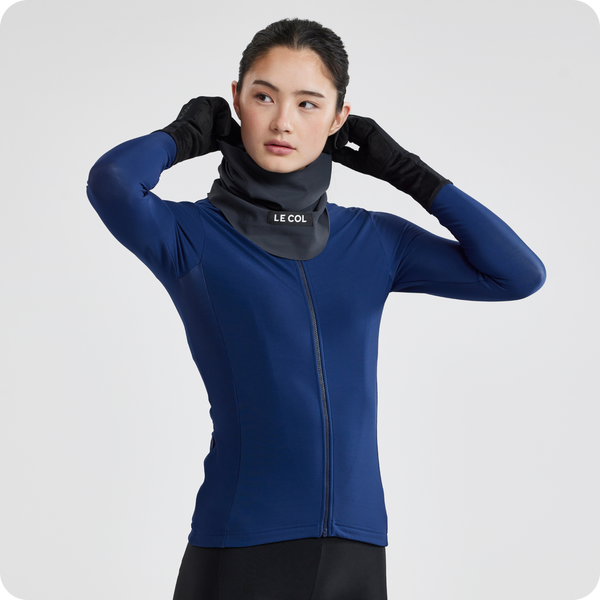 studio shot of female in grey snood.