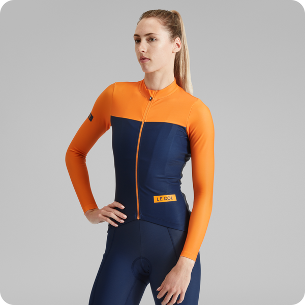 Studio shot of female in sport long sleeve block jersey.