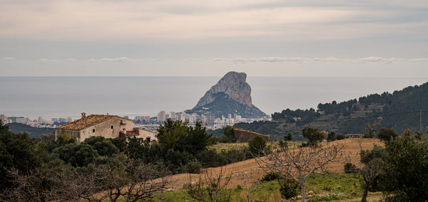landscape shot looking down over calpe city, the sea behind.