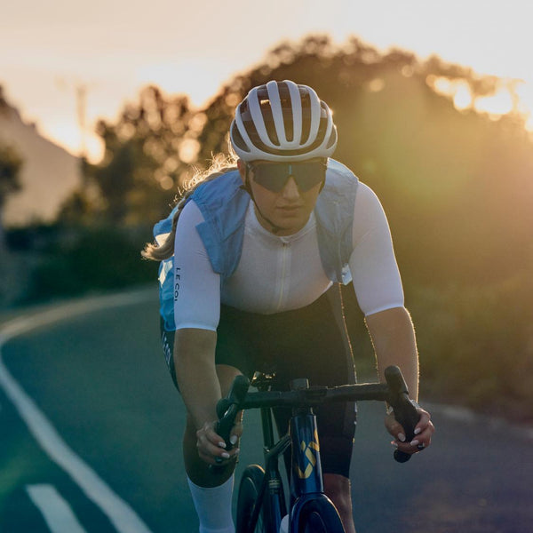 Cyclist riding on a road with a blurred background