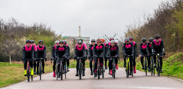 Group photo of the 'Waldy Wheelers' riding together in matching kit.
