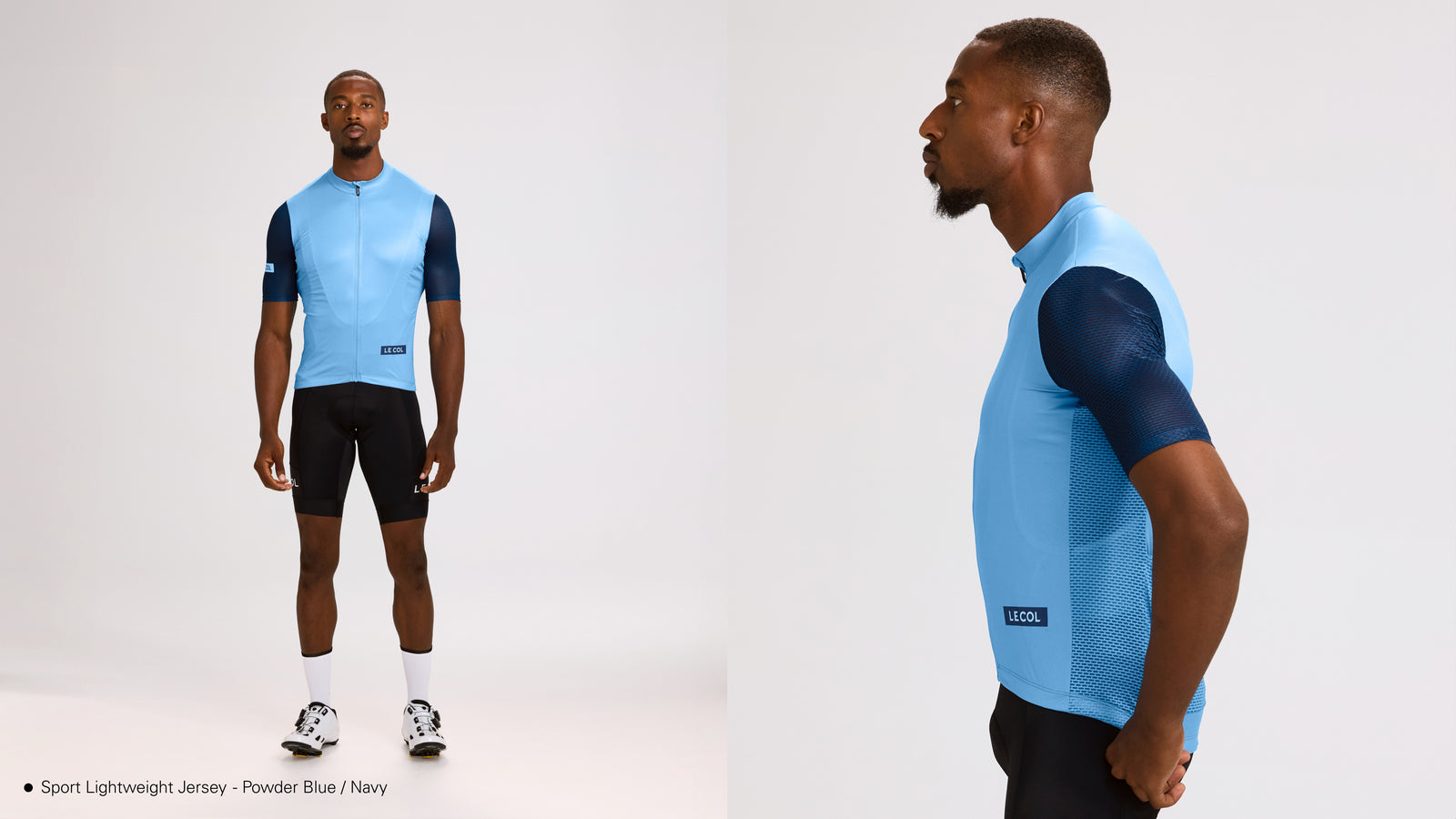 Studio shot of man wearing the light blue lightweight jersey with navy sleeves.